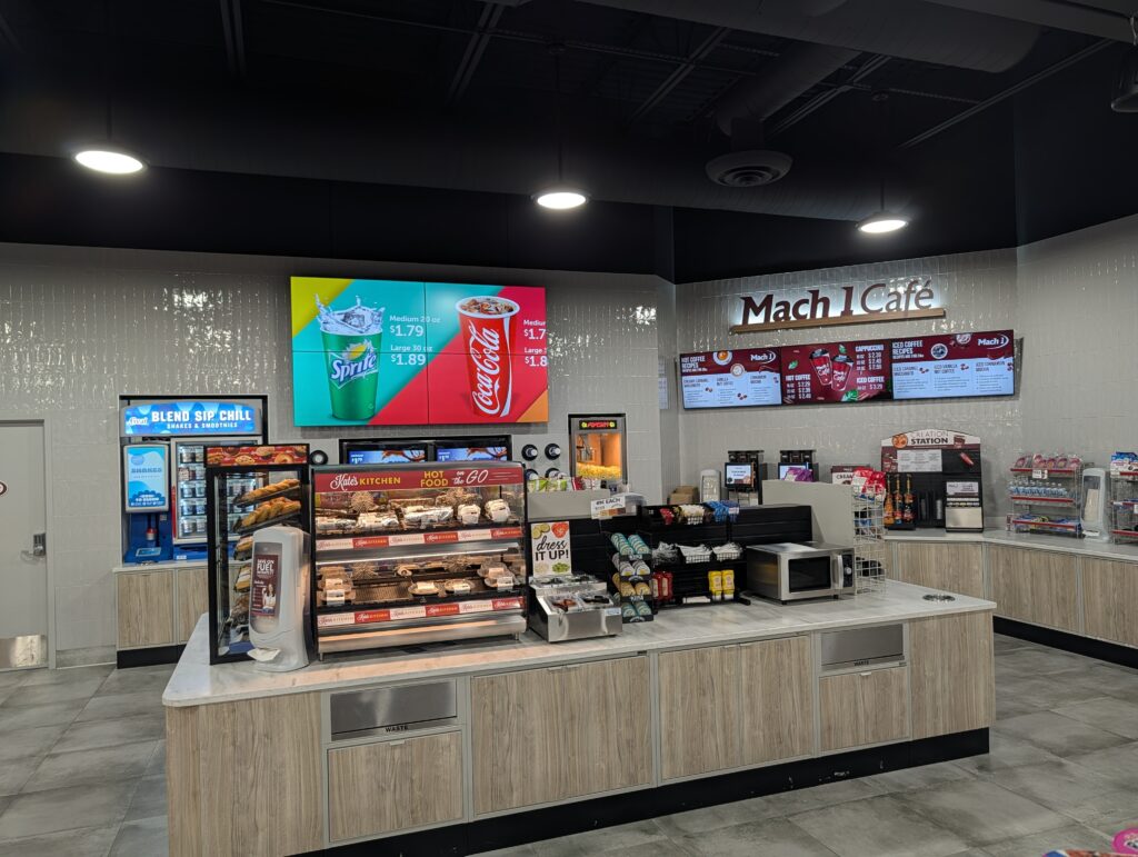 Mach 1 Café digital menu boards installed by EyeCatch Networks, showing dynamic food and drink displays